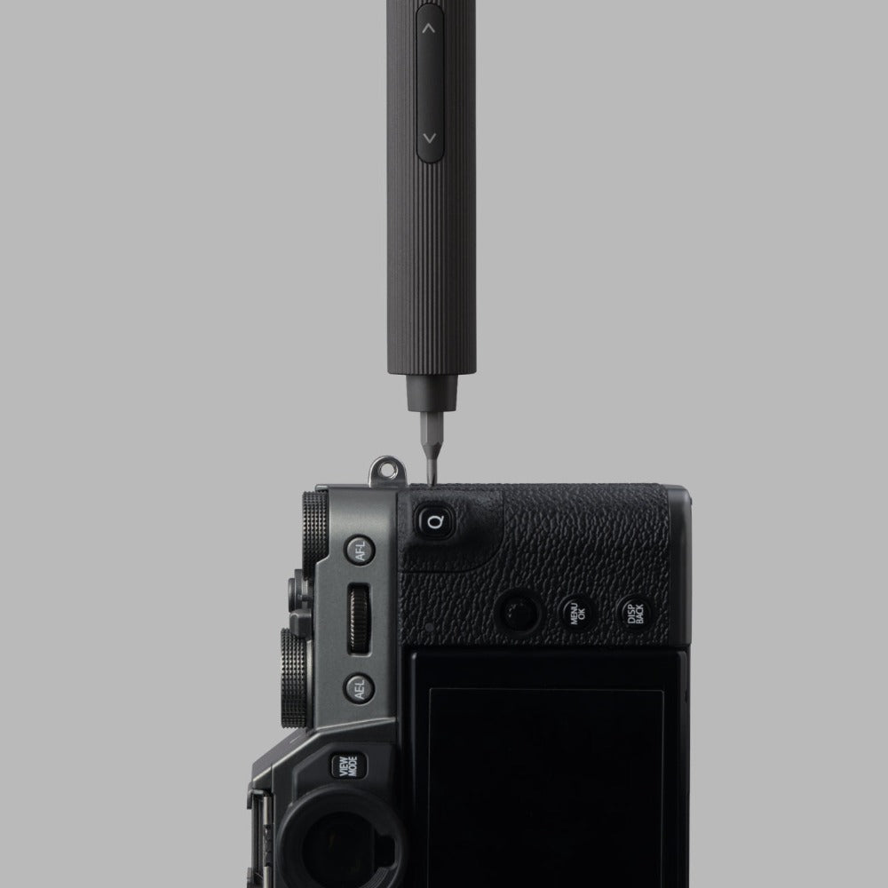 HOTO electric precision screwdriver on a camera