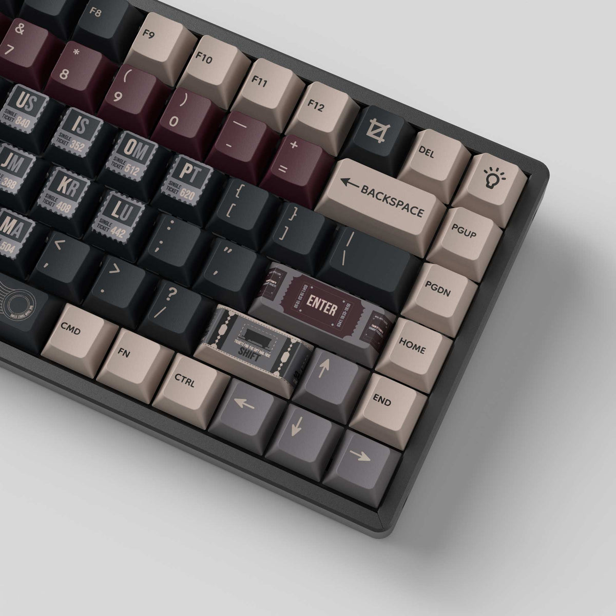 Vintage Stamp keycaps fitted to a keyboard, right side with Enter and arrow keys