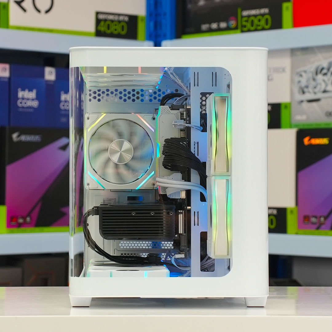 Delta Elite White gaming PC showcasing sleek design and RGB lighting with Ryzen and RX components.