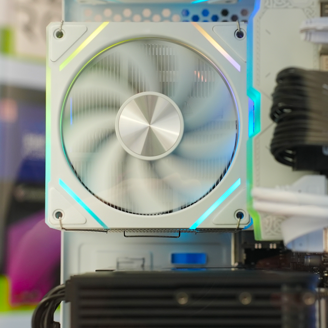 Close-up of a RGB computer fan in a sleek gaming PC, enhancing airflow and aesthetics for optimal performance.