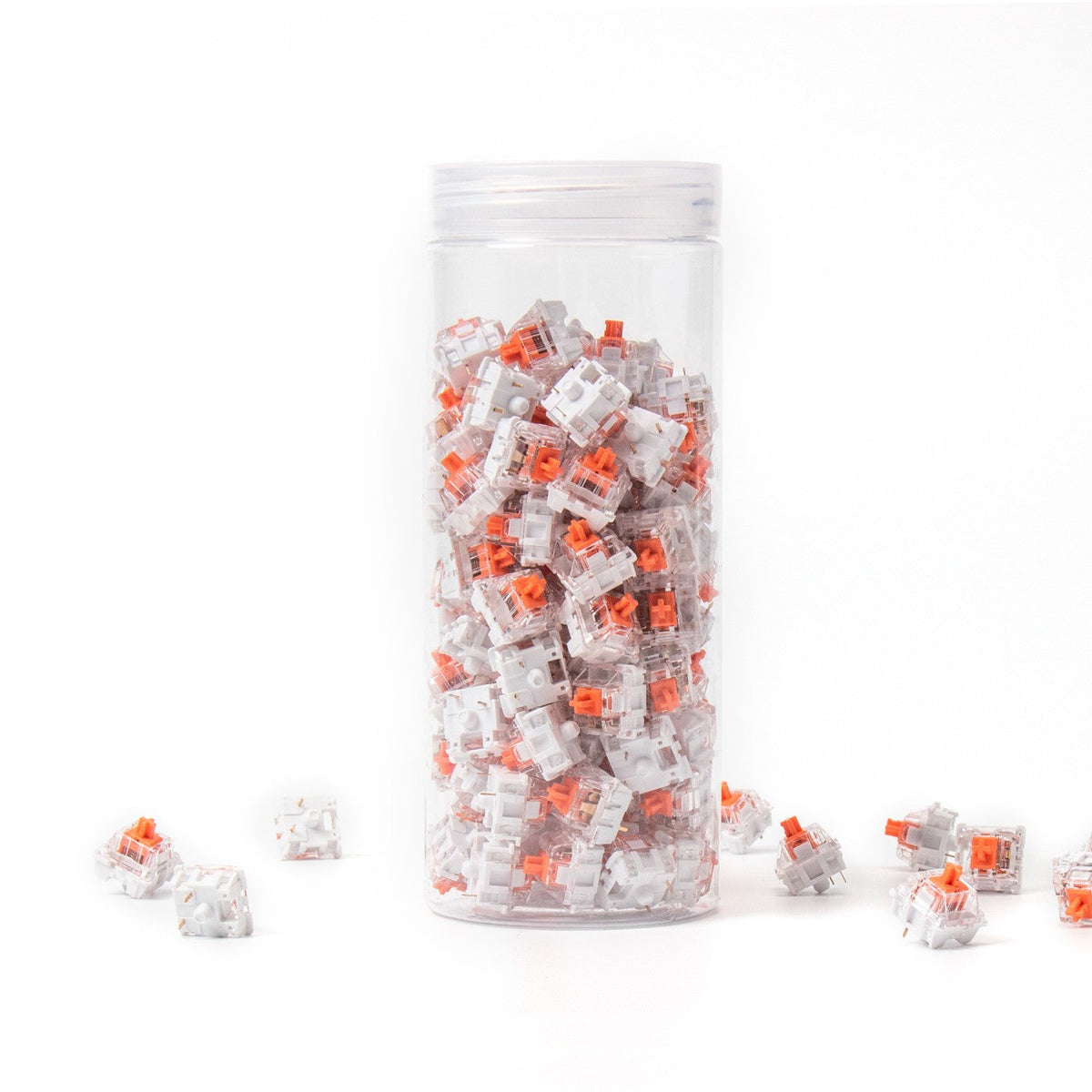 Keychron Silent K Pro Red switches in a bottle, with loose switches