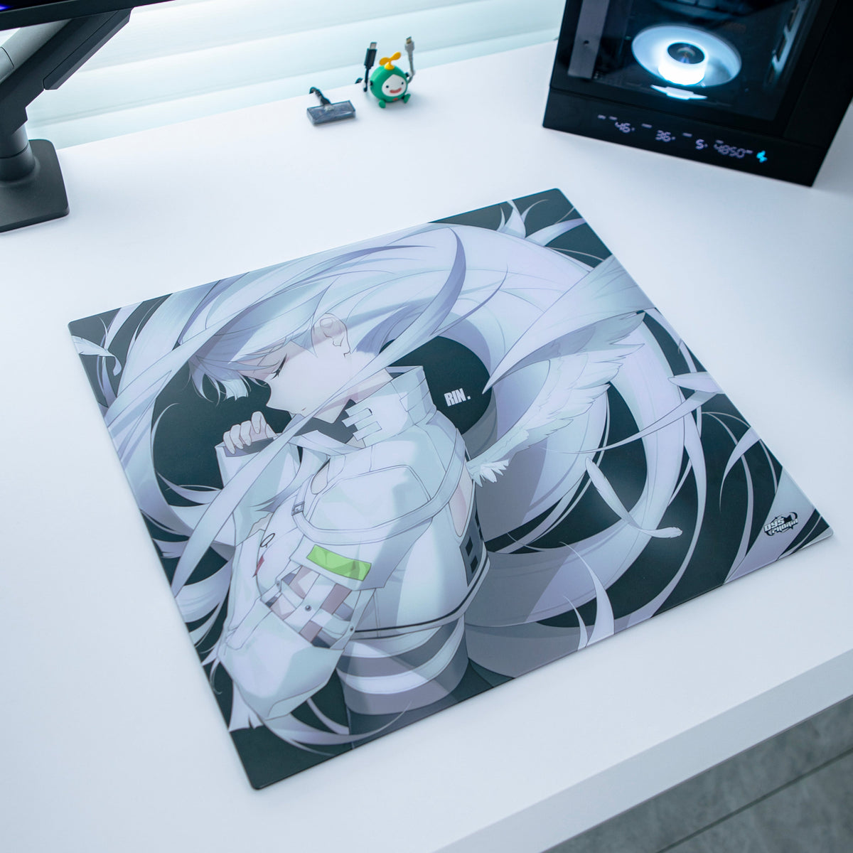 Dysphoria RIN Black glass mousepad on a white desk