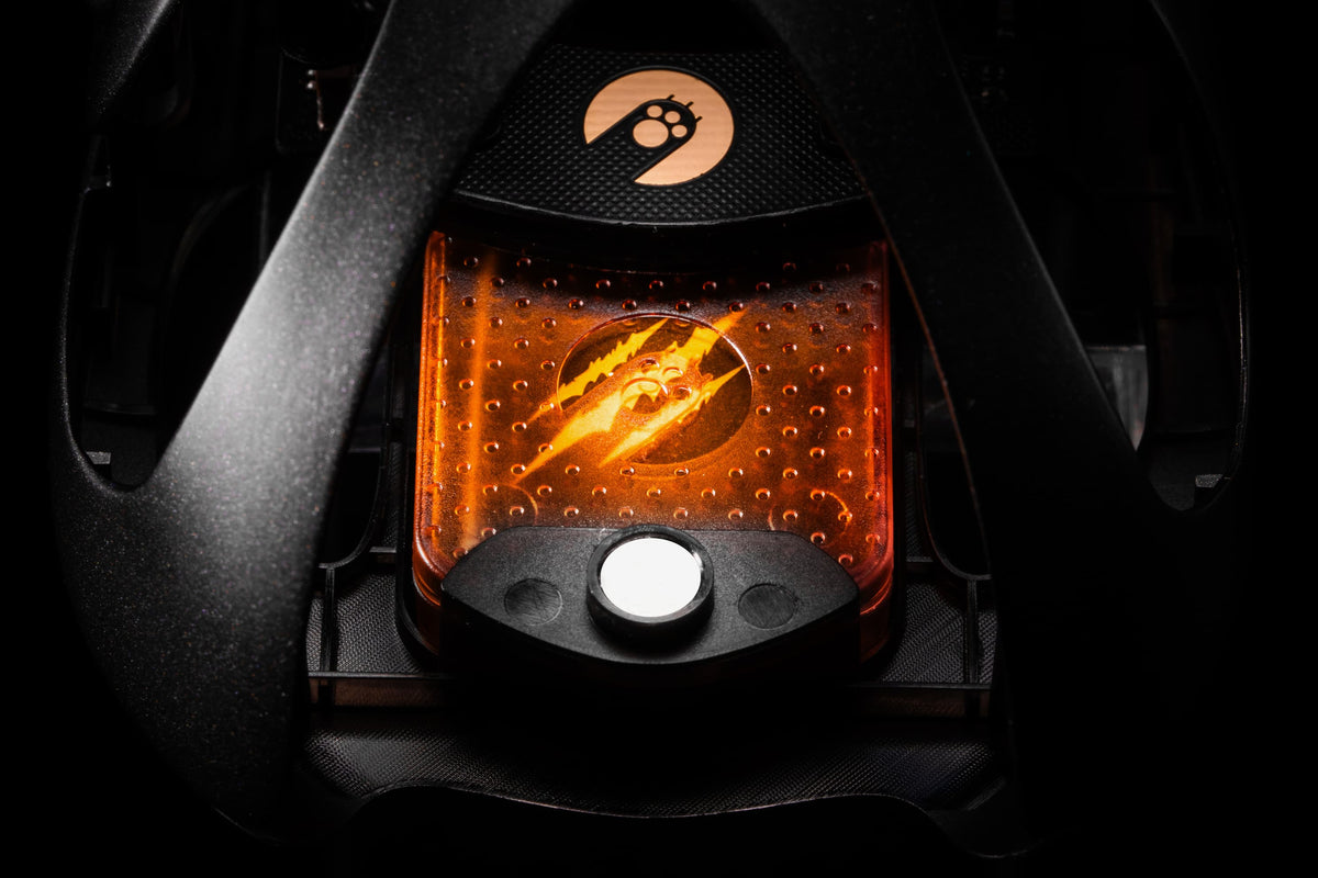 Orange magnetic battery fitted to the AM Infinity Mouse