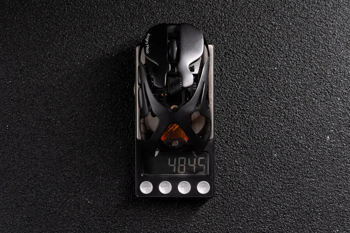 AM Infinity Mouse Basalt Black weighed on a scale